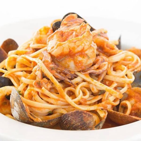 Aurora Ristorante Italiano's linguine pasta with shrimp, mussels, and clams in a rich red sauce.